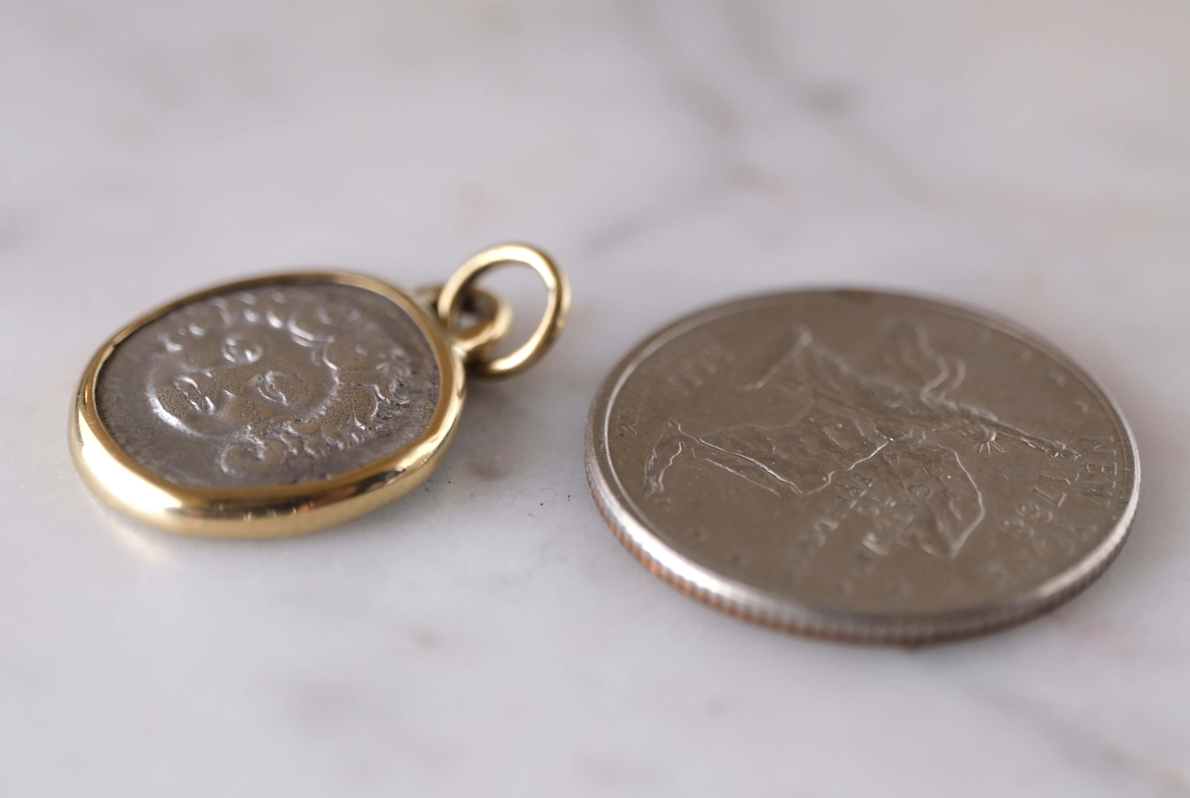 Medusa and Aurora Hand Set in a Custom 18k Gold Bezel