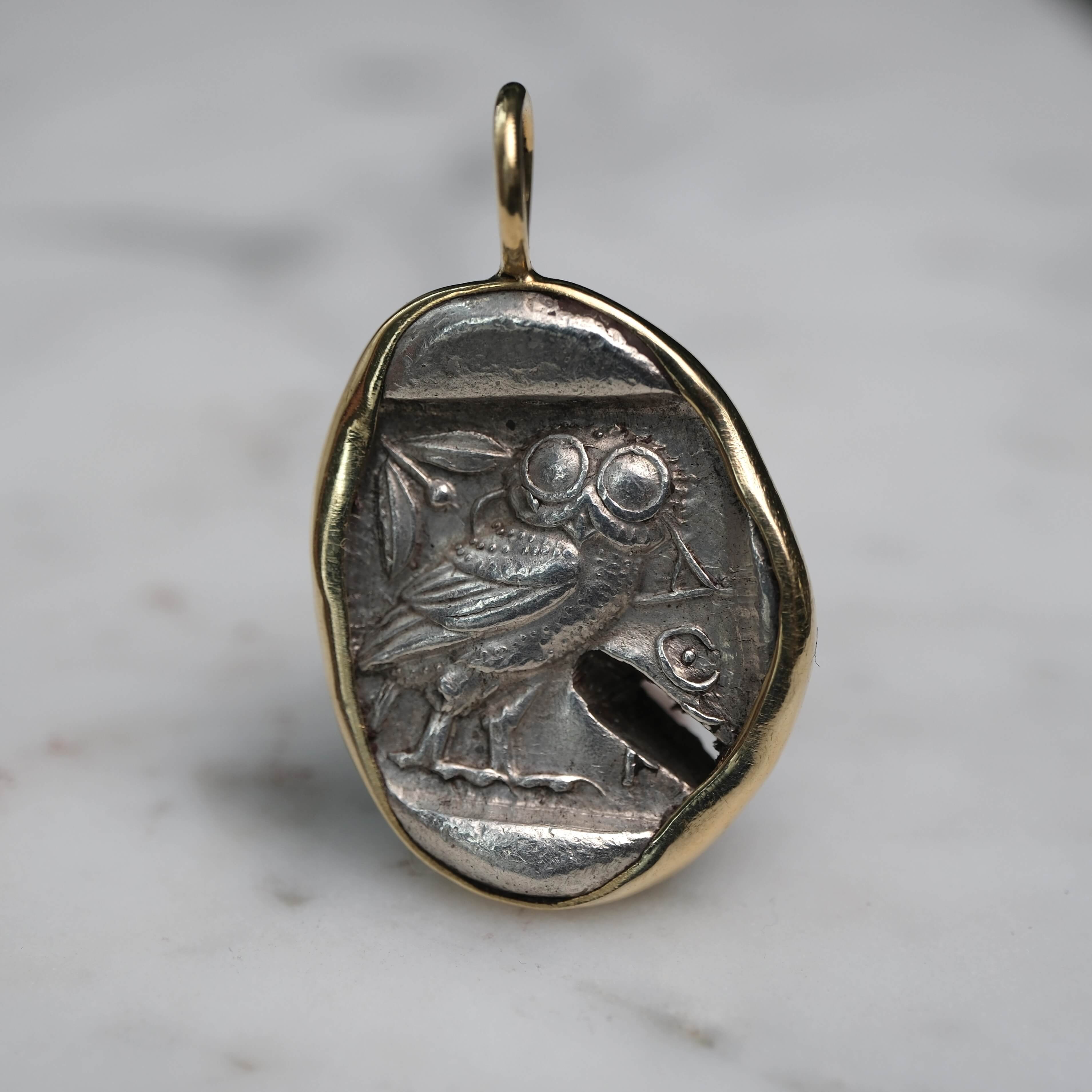 Athenian Owl set in 18k Gold