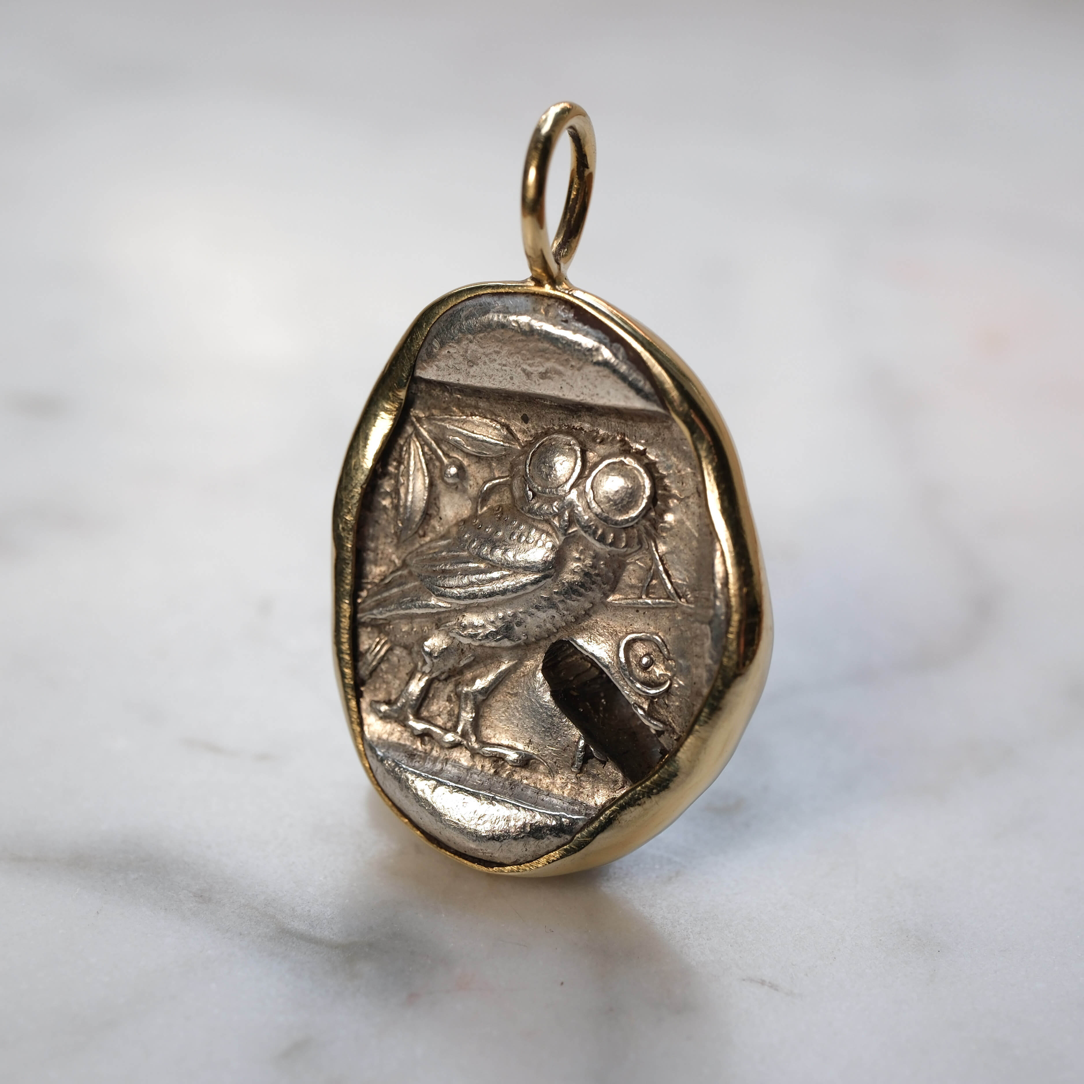 Athenian Owl set in 18k Gold