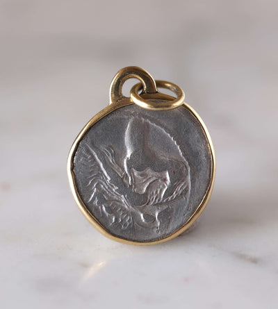Medusa and Aurora Hand Set in a Custom 18k Gold Bezel