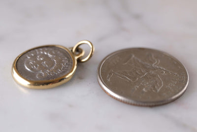 Medusa and Aurora Hand Set in a Custom 18k Gold Bezel