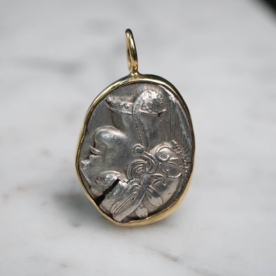 Athenian Owl set in 18k Gold