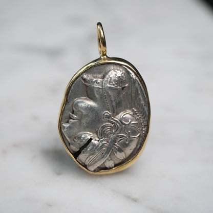 Athenian Owl set in 18k Gold