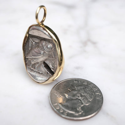 Athenian Owl set in 18k Gold