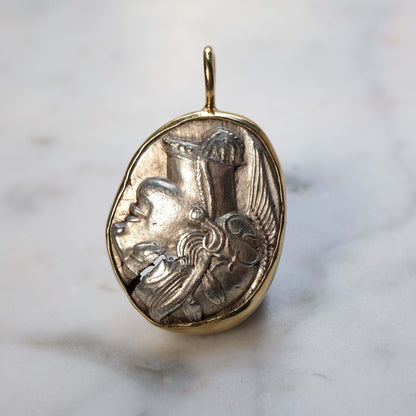 Athenian Owl set in 18k Gold