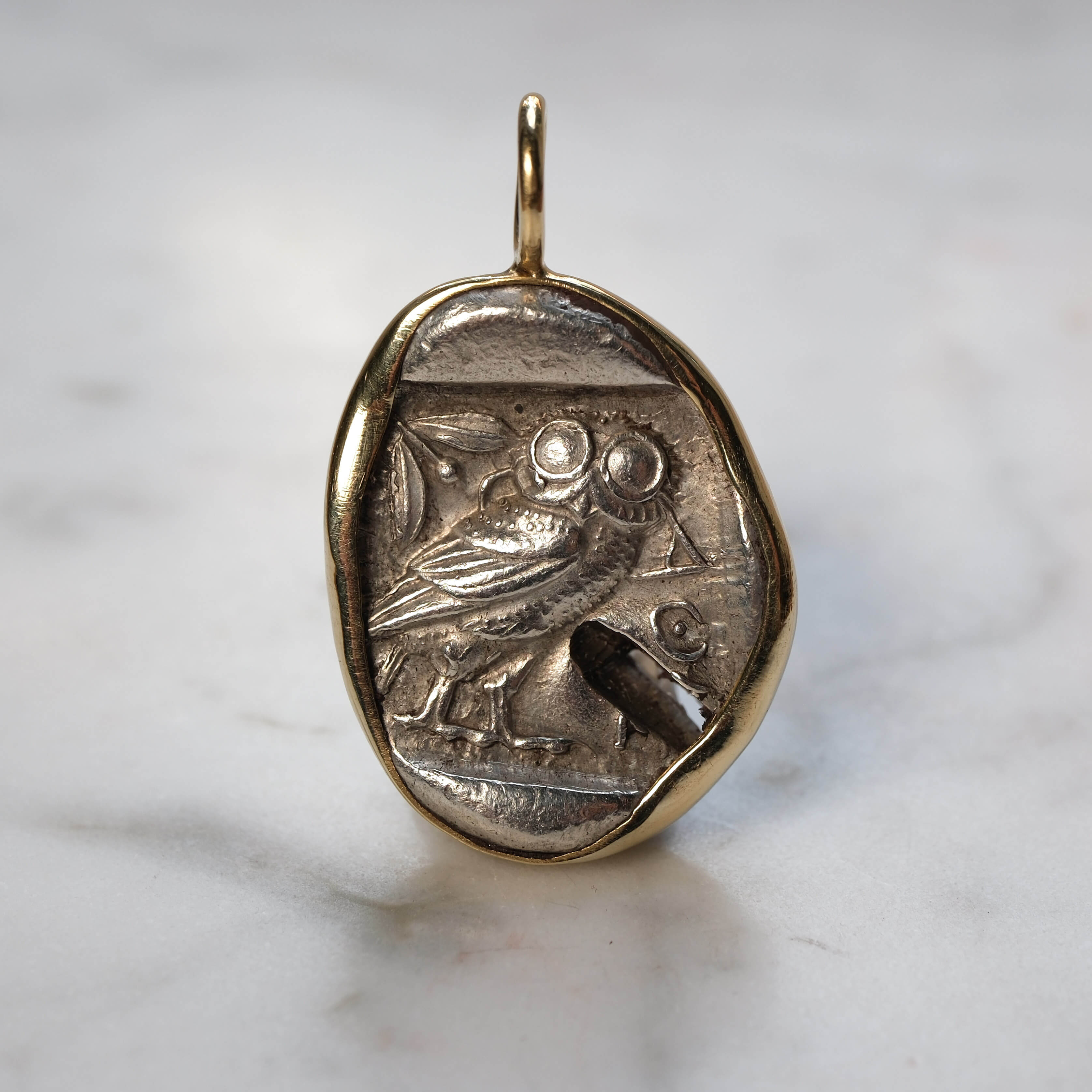 Athenian Owl set in 18k Gold